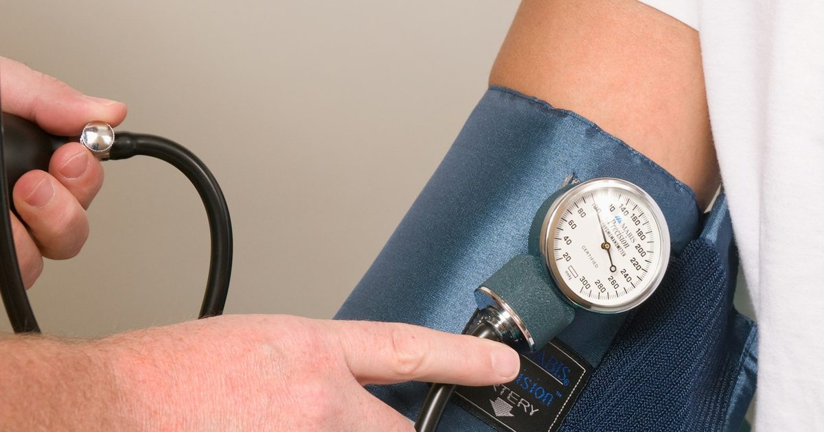 A CareGiver helps a patient manage chronic disease medication at home